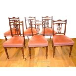 A set of six chairs.