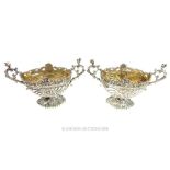 A pair Sterling Silver ornate table salts.