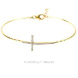 Diamond cross cuff bangle.