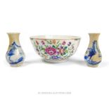 An Antique Chinese famille rose bowl and two miniature blue and white vases.