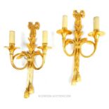 Pair of Louis XVI Style ornate gilt brass wall lights.