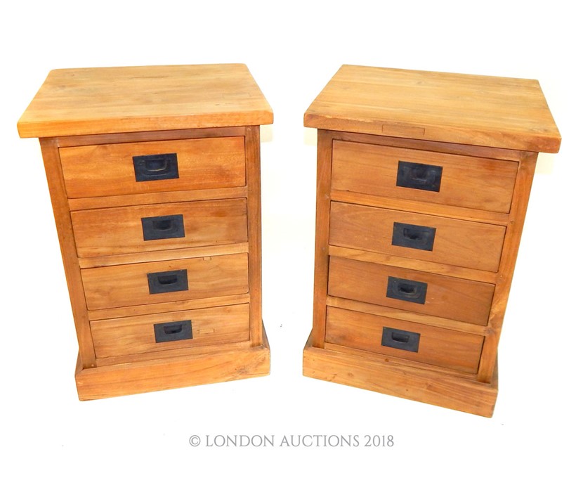 A pair of teak bedside chests by Raft