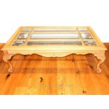 A Glass Top Coffee Table