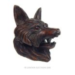 A black forest inkwell in the form of a fox.