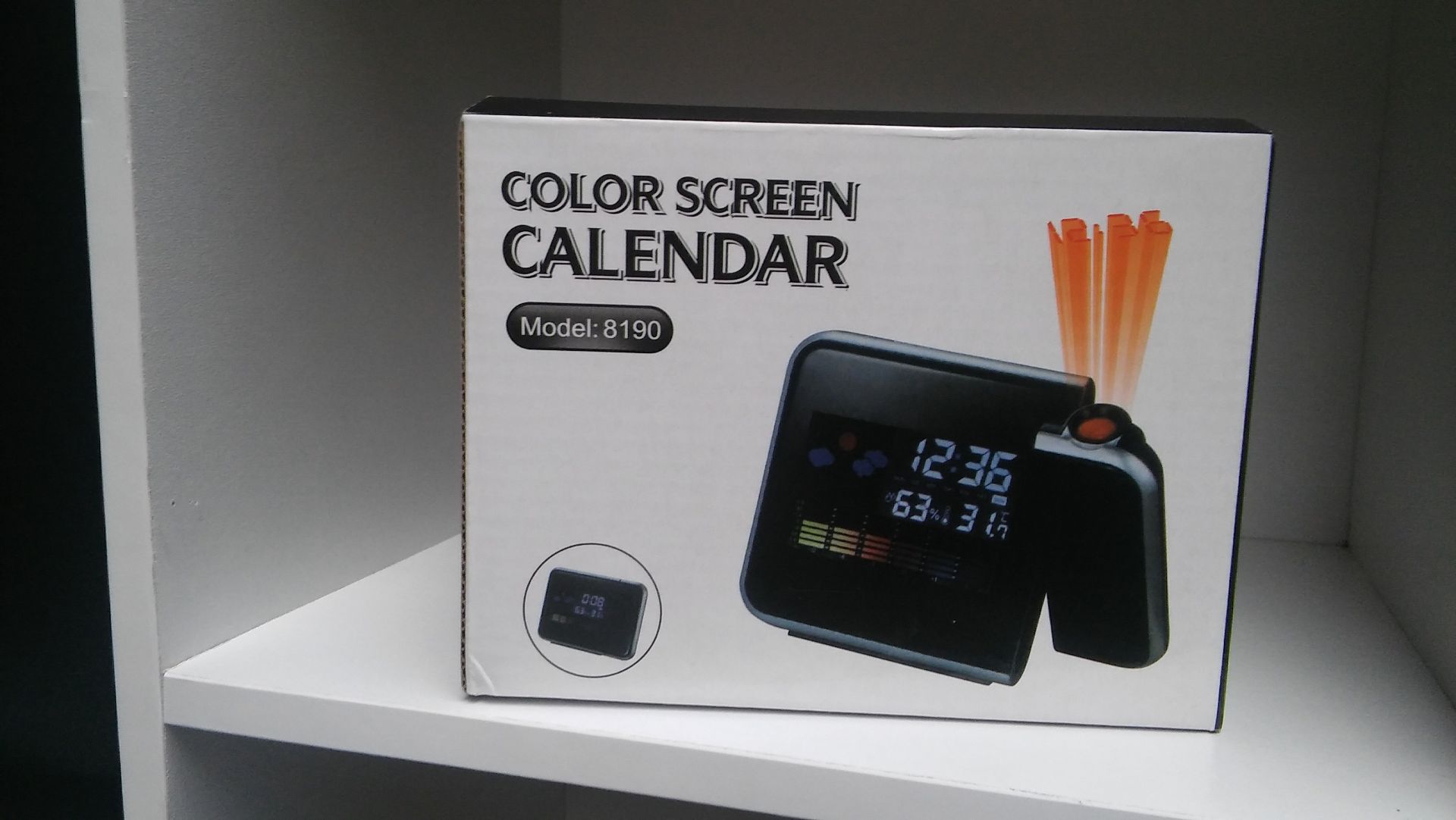 "Colorscreen" calender/weatherstation with projection alarm clock. New. RRP - £50