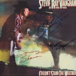Stevie Ray Vaughan and Double Trouble Signed Couldn't Stand the Weather Album