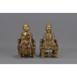 PAIR OF CHINESE GILT PORCELAIN IMMORTALS