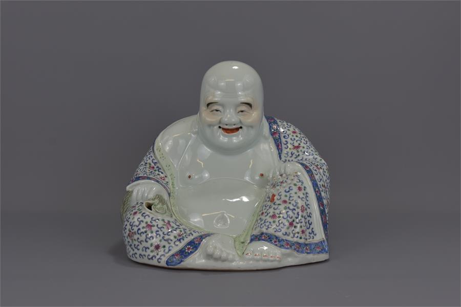 A CHINESE WEI HONG TAI PORCELAIN BUDDHA