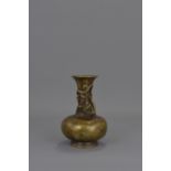 A CHINESE BRONZE DRAGON VASE