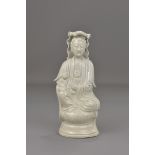 A CHINESE BLANC DE CHINE PORCELAIN FIGURE