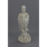 A CHINESE BLANC DE CHINE PORCELAIN FIGURE