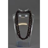 A GRANITE STONE BEADED NECKLACE