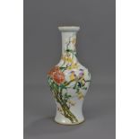 A CHINESE FAMILLE ROSE PORCLAIN VASE