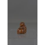 A JAPANENSE BOXWOOD NETSUKE