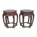 A pair of Chinese 19th century hardwood stools with hexagonal top decorated with a scrolling flowers