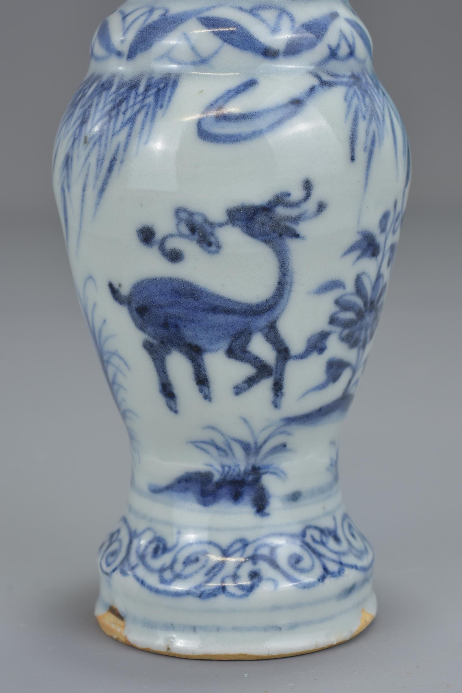 A Chinese 17th century Ming dynasty blue and white porcelain vase with twin handles decorated with f - Image 12 of 13