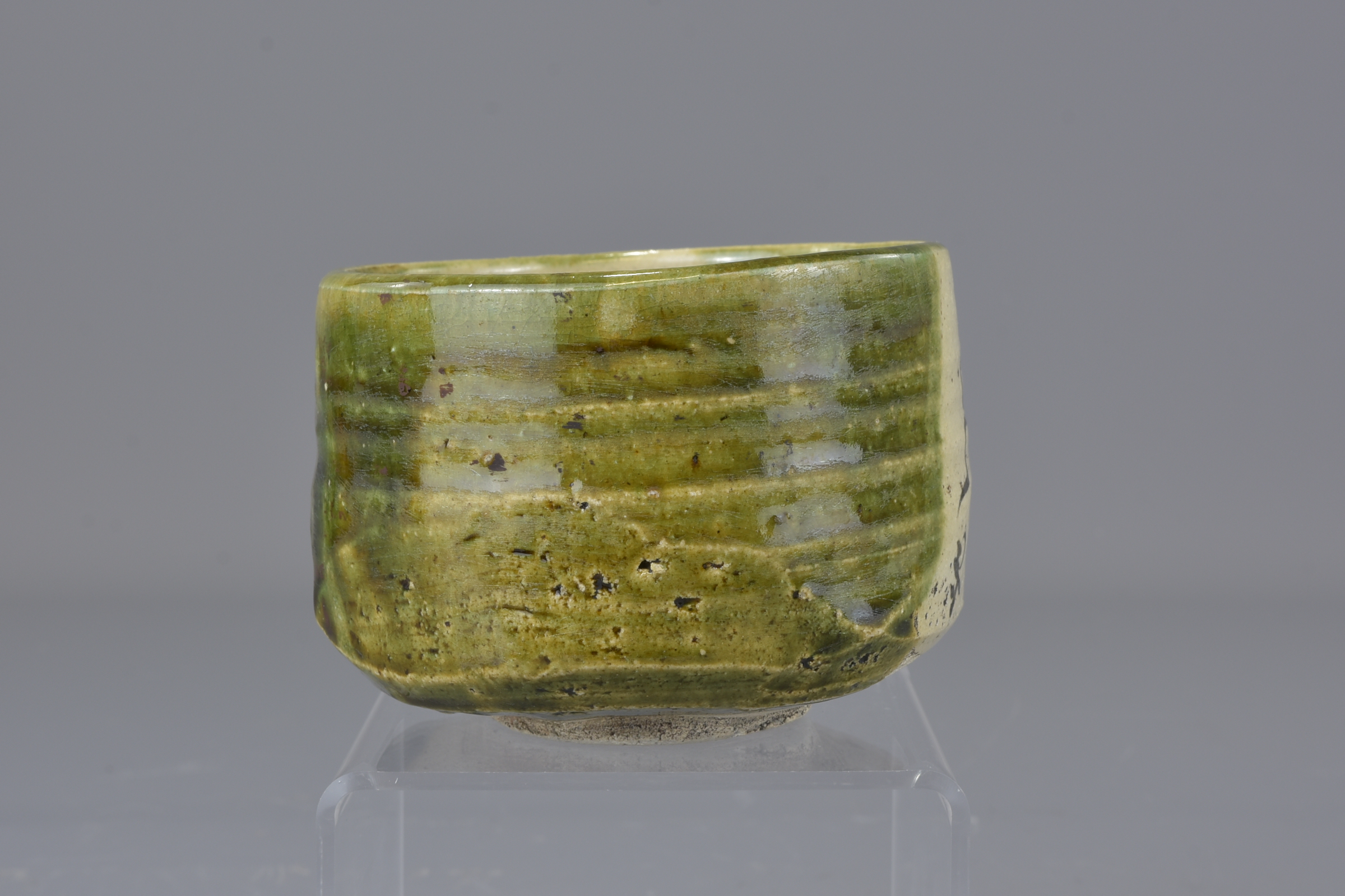 A Japanese early 19th century green glazed tea bowl with black double gourd decorations. 12cm Proven - Image 4 of 7