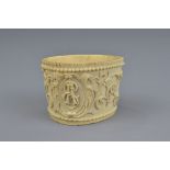 A 19th century Asian carved bone napkin ring with initials G.W. 5cm