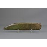 A Chinese ceremonial jade axe head. 28 cm length.