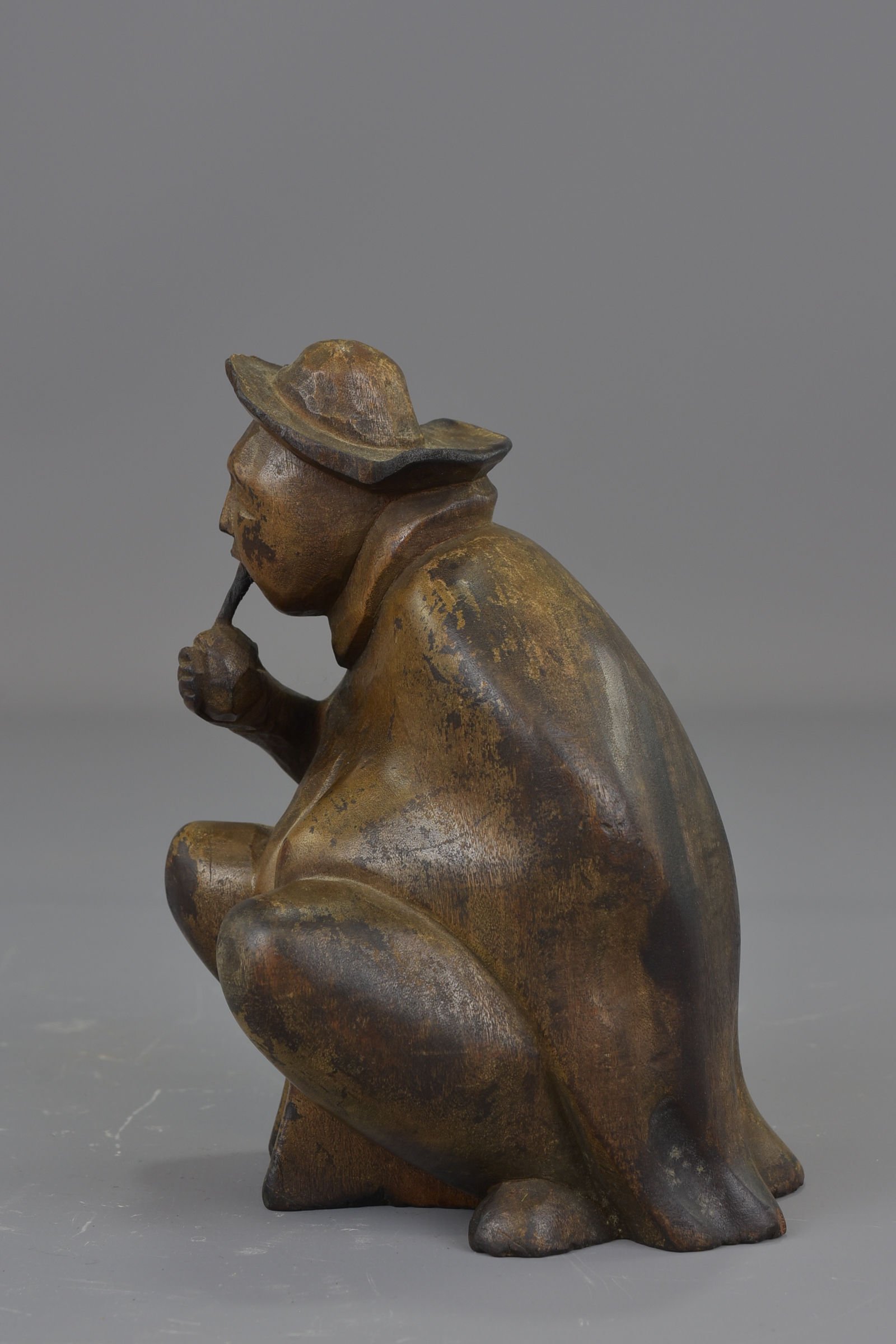 A Japanese 19th century carved wooden seated figure. 14 cm tall. - Image 2 of 5