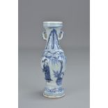 A Chinese 17th century Ming dynasty blue and white porcelain vase with twin handles decorated with f