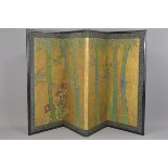 A Japanese 19th century four panel folding screen decorated with paintings of Bamboo on gold leaf. O