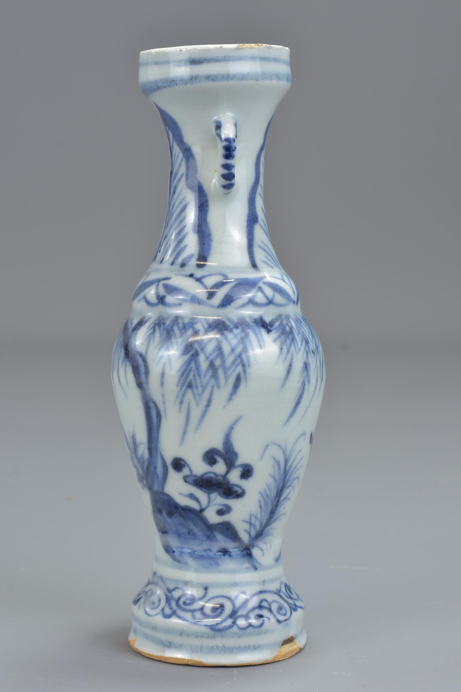 A Chinese 17th century Ming dynasty blue and white porcelain vase with twin handles decorated with f - Image 7 of 13