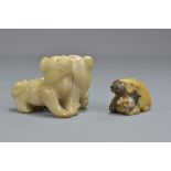 A Chinese jade carving of two dogs conjoined together with a smaller jade ram. Dogs 7cm length. Ram