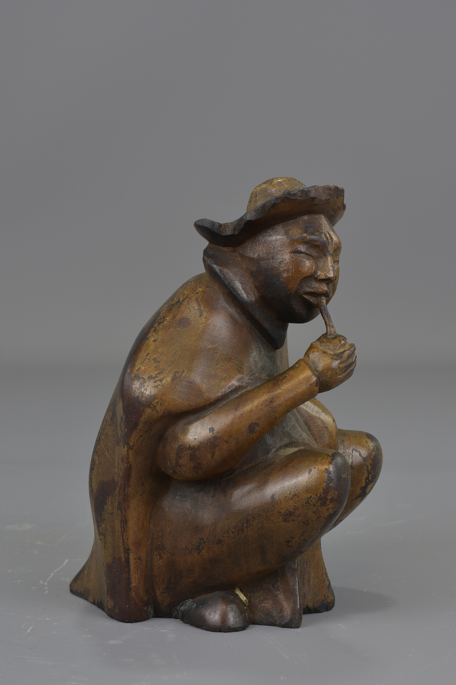 A Japanese 19th century carved wooden seated figure. 14 cm tall. - Image 4 of 5