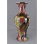 A large and rare Chinese 18th century peach bloom glaze porcelain baluster vase. 53cm tall. Provenan