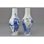 A fine pair of Chinese 19th century blue and white olive shaped porcelain vases decorated with figur
