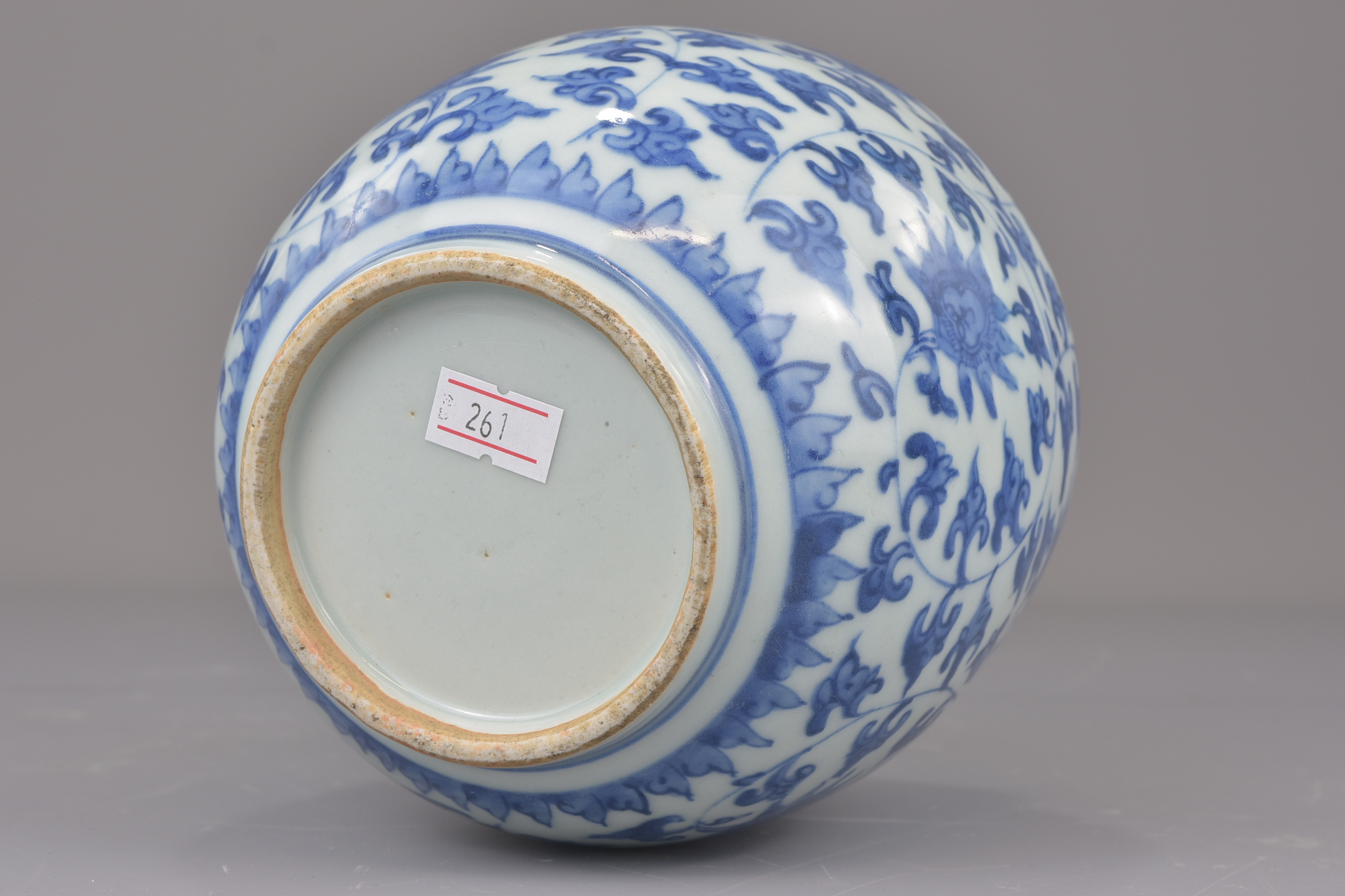 A Chinese blue and white porcelain jar possibly Ming painted with a floral design. 16cm tall - Image 5 of 7