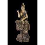 A very large Chinese 19/20th century wooden figure of Guanyin with lacquer gilding. 146cm tall