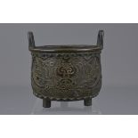 A Japanese 19th century bronze censer on three legs with two handles. 12cm x 12cm. Provenance: Held