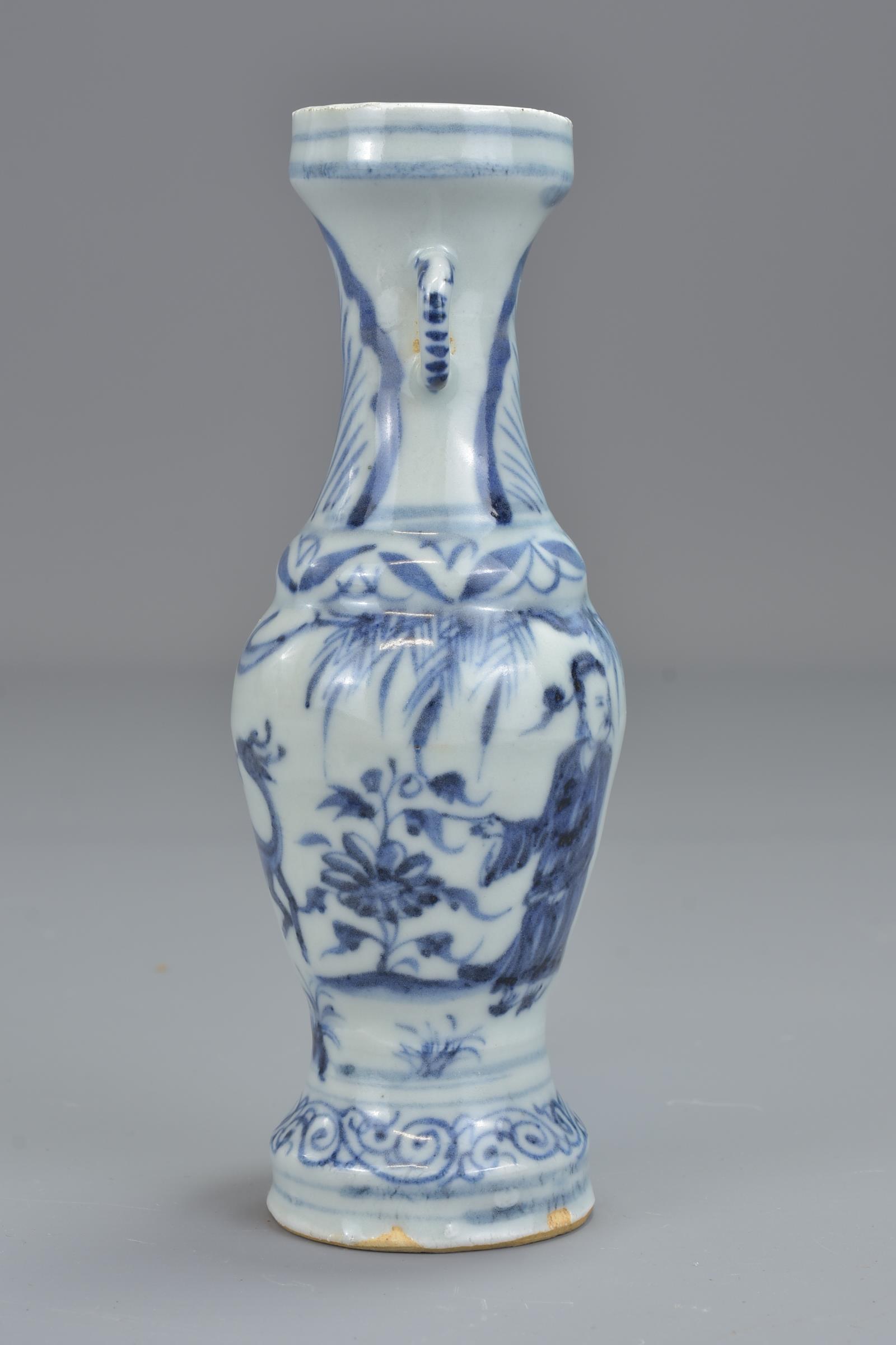 A Chinese 17th century Ming dynasty blue and white porcelain vase with twin handles decorated with f - Image 6 of 13