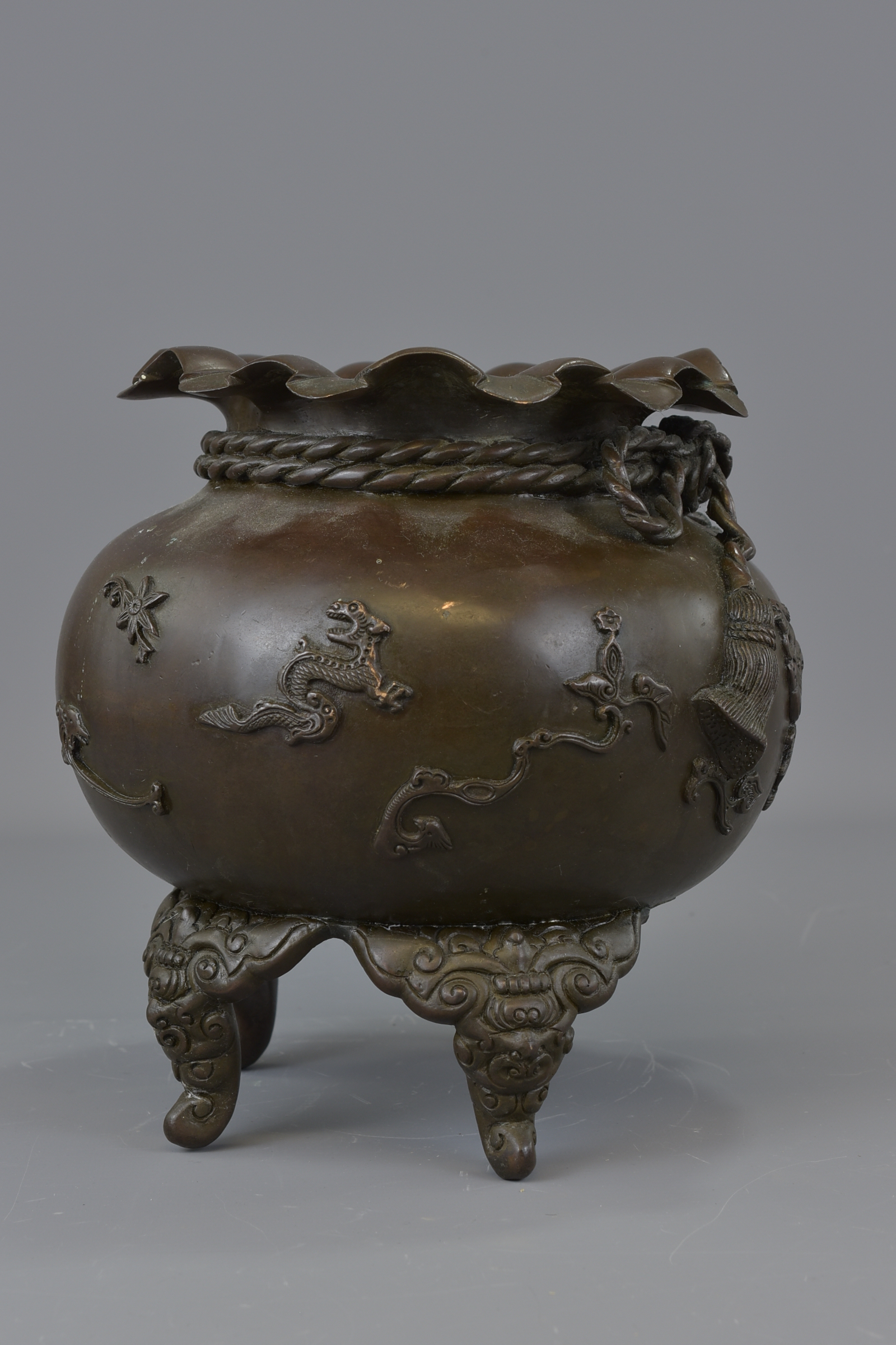 A Japanese 19th century Meiji period bronze censer. One leg missing. Makers mark to base. 23cm wide - Image 4 of 7