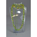 A jade beaded necklace