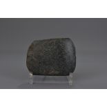 A Chinese Neolithic stone axe head. 10x12cm