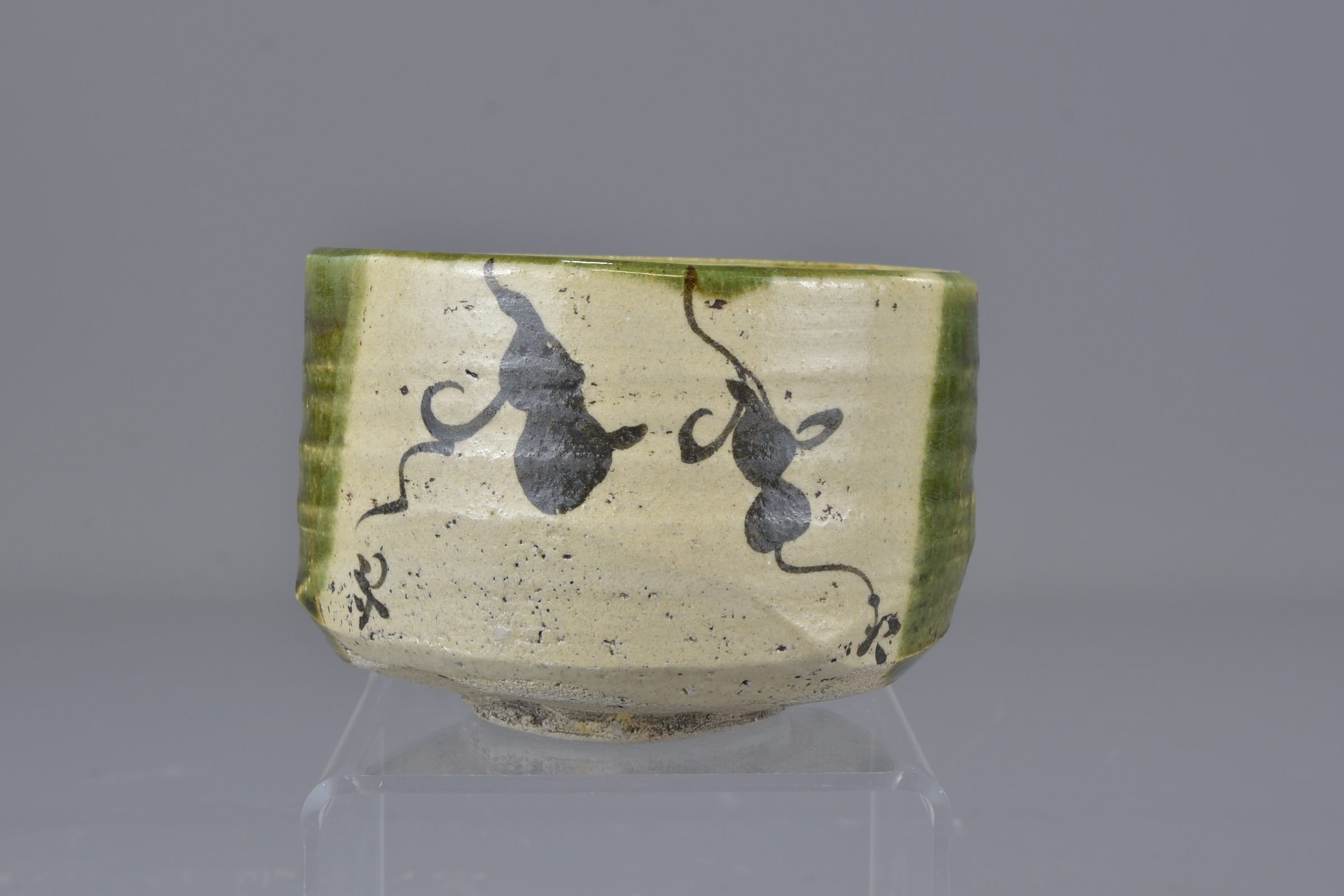 A Japanese early 19th century green glazed tea bowl with black double gourd decorations. 12cm Proven - Image 2 of 7