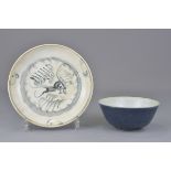 A Chinese Ming dynasty blue and white porcelain dish 17cm diameter with a Teksing cargo sticker to b