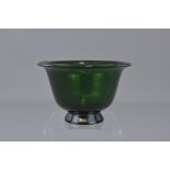 A Chinese 19th century green glass bowl. 13.5 (D)