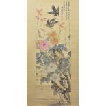 A Chinese 1930's watercolour painting on paper in scroll of flowers and birds. Signed with two red s