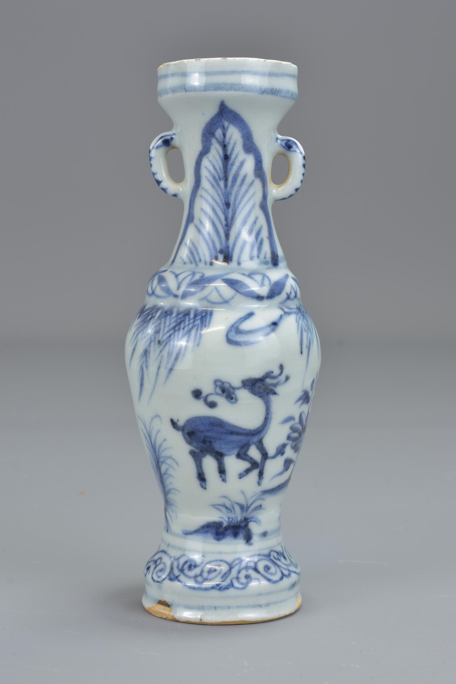 A Chinese 17th century Ming dynasty blue and white porcelain vase with twin handles decorated with f - Image 5 of 13