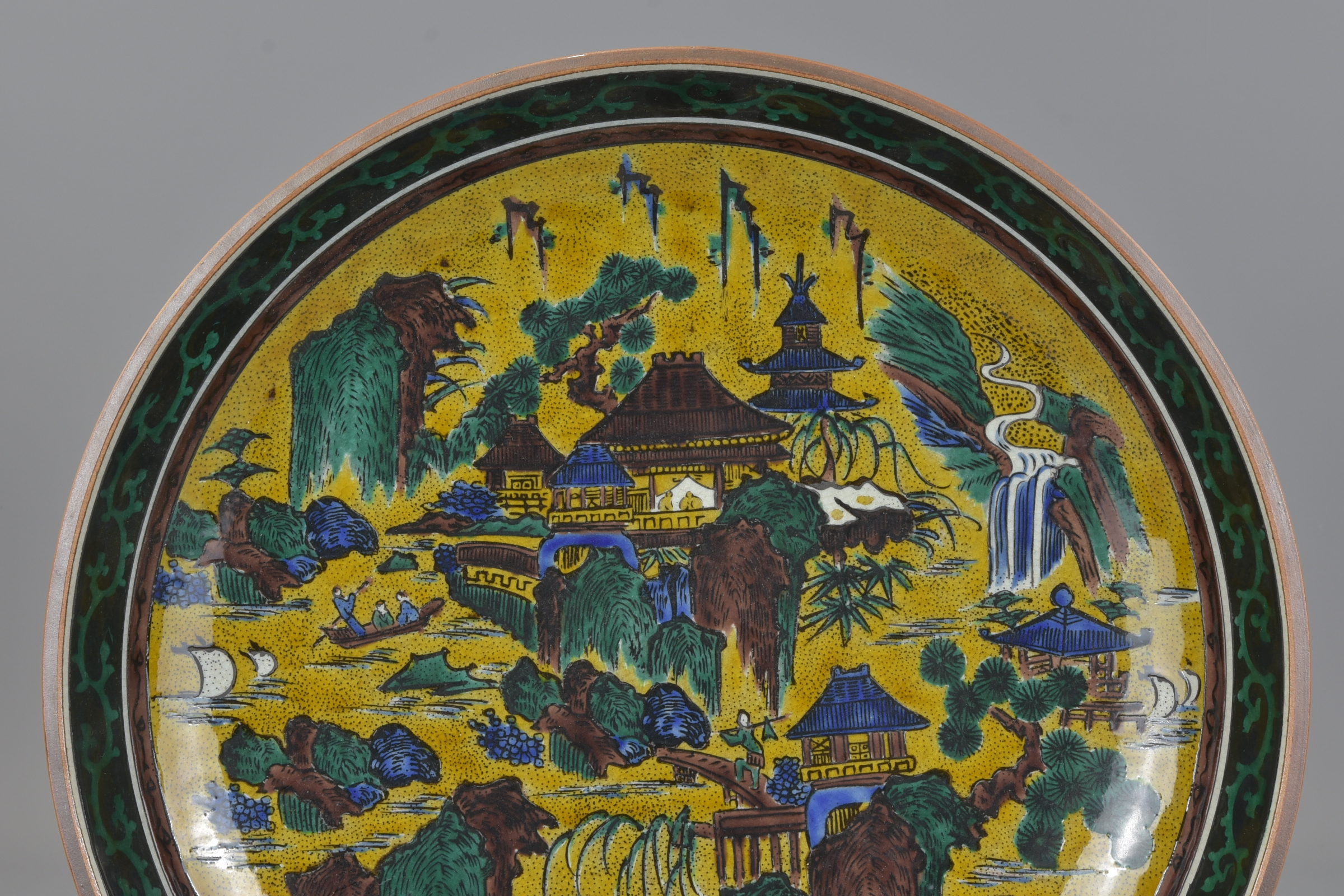 A very large Japanese 19th century Kutani pottery dish decorated with a coastal village scene signed - Image 3 of 8