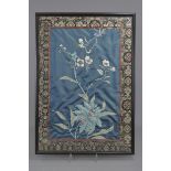 A Chinese 20th century embroidery on silk of flowers framed. 39cm x 55cm