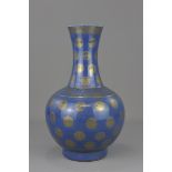 A Chinese 19th century blue glazed porcelain bottle vase mark and period of GuangXu. 38cm tall