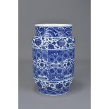 A Chinese 19/20th century or earlier Ming style blue and white porcelain cylindrical vase decorated