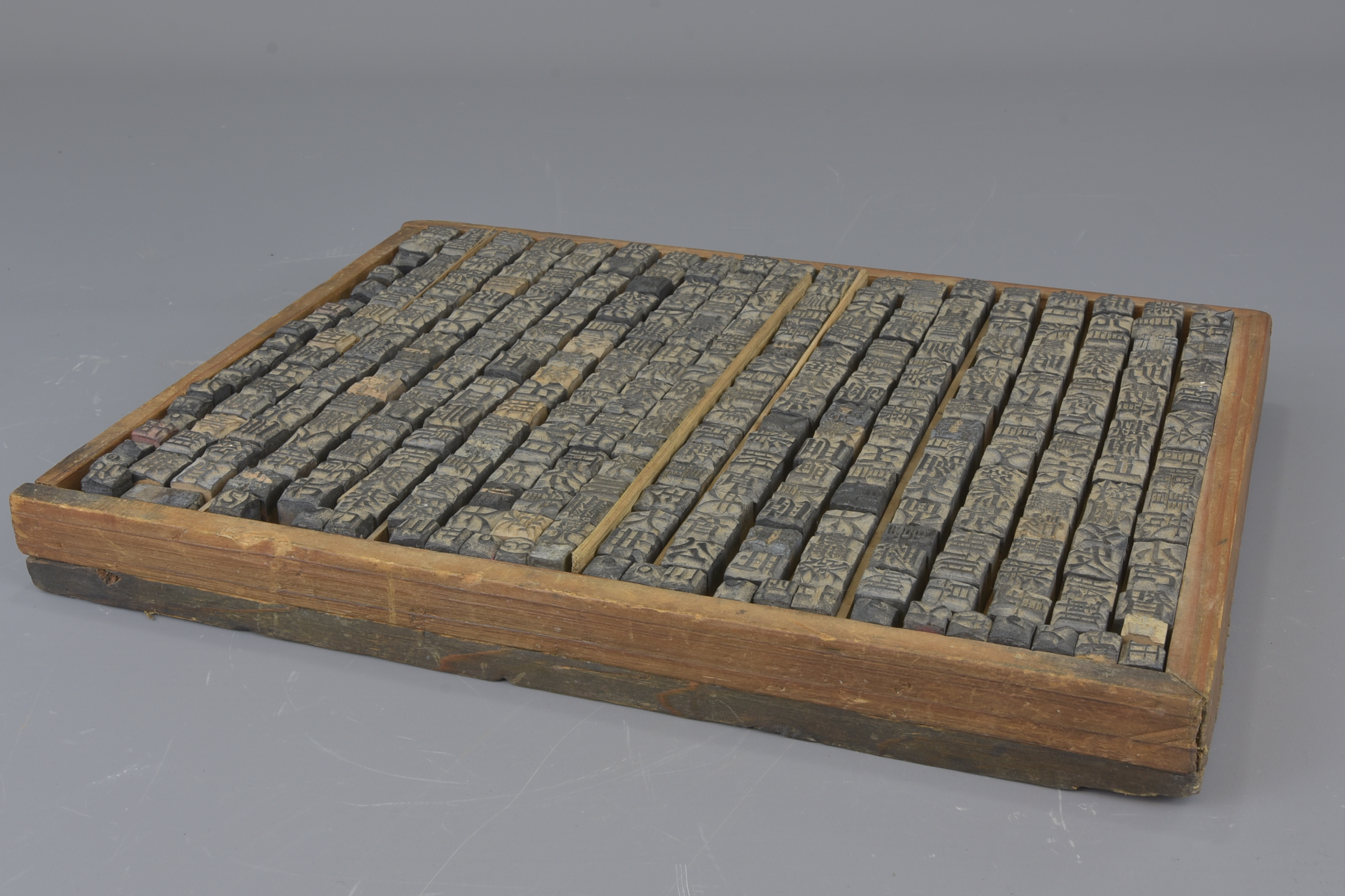 A Chinese early 20th century printing block with individually carved wooden character stamps. 24cm x - Image 2 of 3
