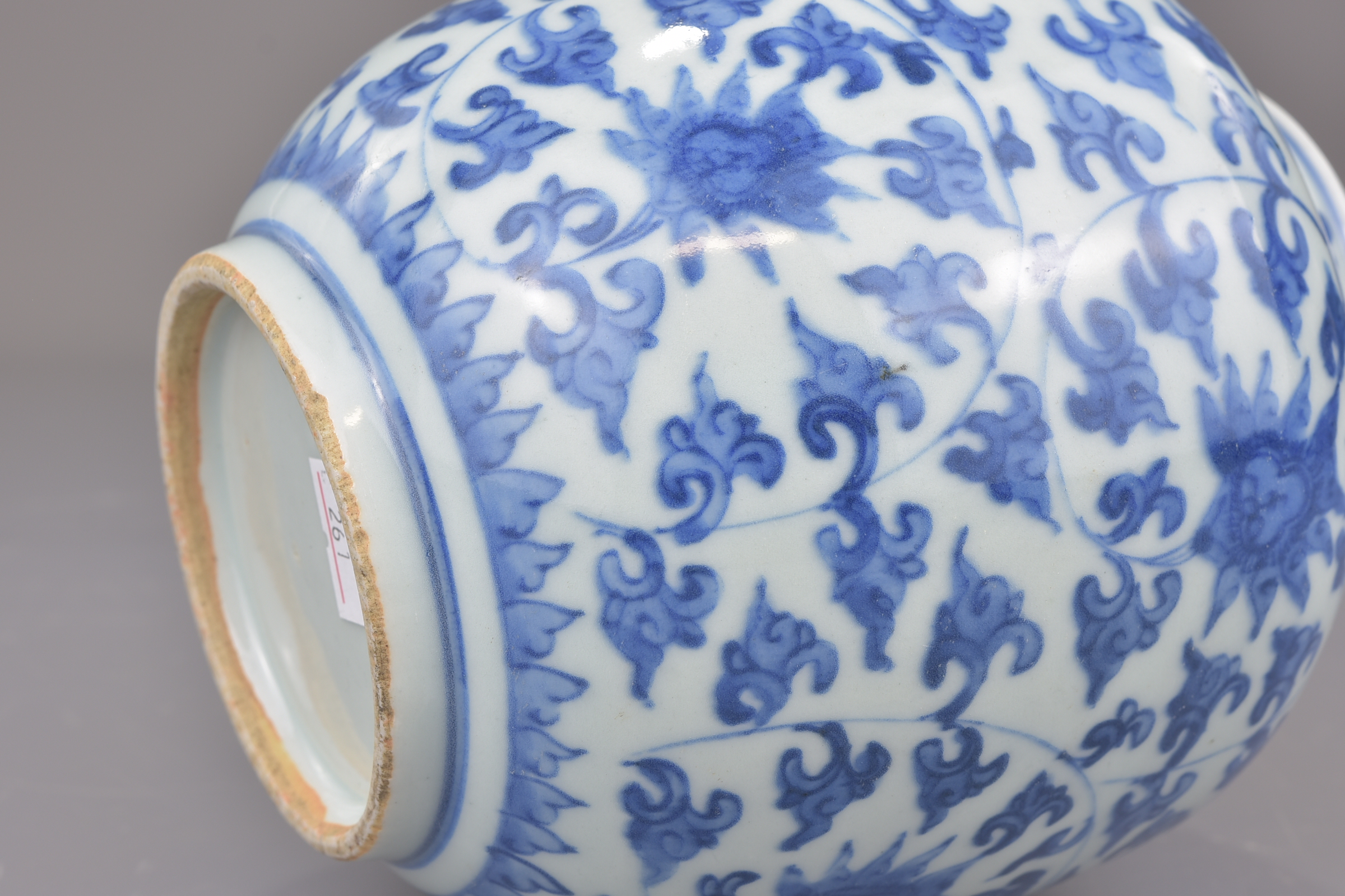 A Chinese blue and white porcelain jar possibly Ming painted with a floral design. 16cm tall - Image 6 of 7