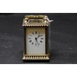 A 19th Century French lacquered and brass carriage clock.